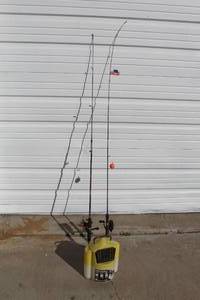 lot 144 image: Fishing pole and minnow bucket see pictures for brands