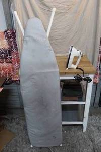 lot 176 image: Iron and ironing board