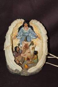 lot 213 image: Native American-inspired angel figurine, nite light see next picture for it lit up