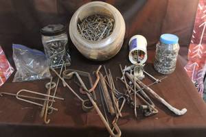 lot 243 image: A mix of nails screws and more see pictures