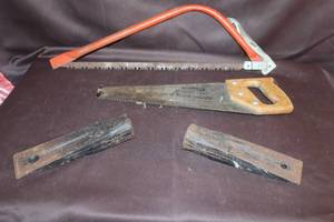 lot 250 image: vintage hand saws and a bow saw. And more see pictures