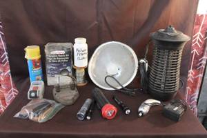 lot 280 image: Mixed collection of various camping and utility items, including several types of lighting and repair kits. Bug zapper and more see pictures