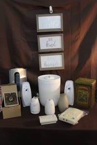 lot 287 image: Mixed lot  general household goods, like air fresheners and bag holder and wall decor and more see pictures for details