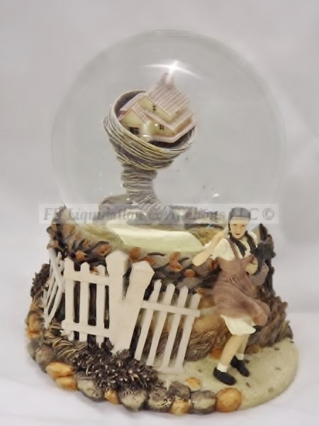 lot 120 image: Oz Music box snow globe