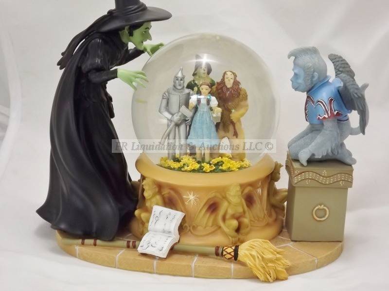 lot 122 image: Oz Music box snow globe