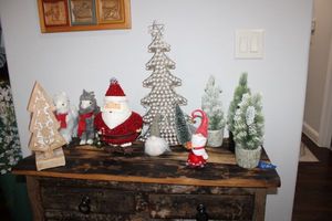 lot 84 image: Christmas dcor Red Santa, trees, furry llamas