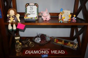 lot 144 image: Misc. lot Simpsons toys, metal Hawaii Diamond Head sign, Brass Rickshaw bicycle and more