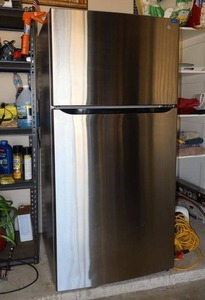 lot 7 image: LG Outdoor Refrigerator Freezer model LHTNS2403S (Purchased about 2 years ago. This is made to go in the garageporch.)