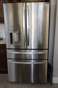lot 2 image: GE Refrigerator Freezer model PVD28BYNHFS. 36W x 36D x 70H. Owner purchased about 1 year ago