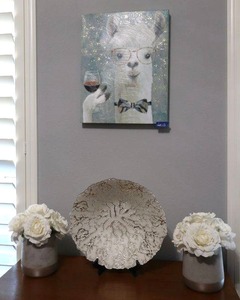 lot 13 image: Home Dcor Llama canvas art, Silver and white plate, vases with white flowers