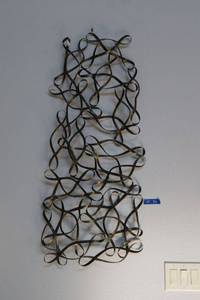 lot 34 image: Twisted metal wall art - 18W x 44H