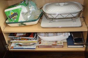 lot 62 image: Chafing dish, platter with tray, grater, recipe books