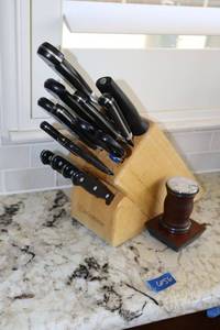 lot 56 image: Knife set (Wusthof wood block) with sharpener
