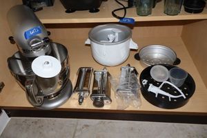 lot 72 image: Kitchen-Aid Artisan stand mixer with ice cream maker and pasta makers