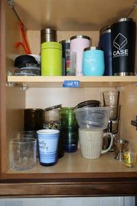 lot 73 image: Travel mugs and glassware