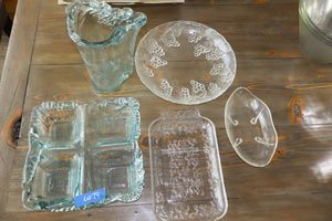 lot 79 image: Recycled glass sectioned relish tray and pitcher, Clear grape cluster plate, and more