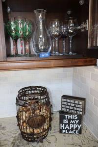 lot 76 image: Rosenthal clear pitchers, wine corks, and wood signs