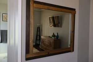 lot 97 image: Wall mirror with rustic wood frame - 48x42