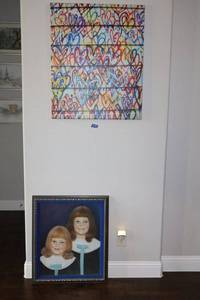 lot 95 image: Wall art hearts canvas 28x33, and framed Print with two girls.
