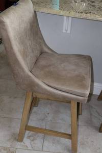 lot 45 image: Faux leather counter height swivel barstool chair
