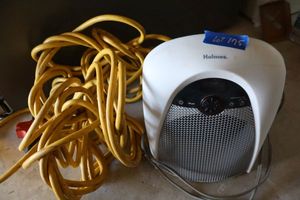 lot 175 image: Holmes personal heater and extension cord