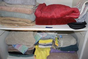 lot 174 image: Bath towels and rubber shoe covers