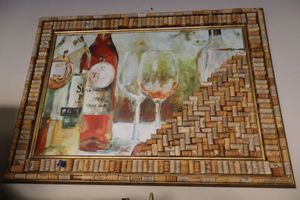 lot 183 image: Wall art of wine bottles and corks