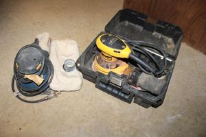 lot 231 image: DeWalt and Ryobi palm sanders