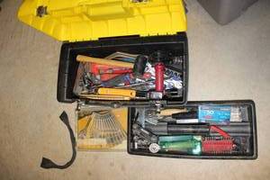 lot 236 image: Yellow and black toolbox with tools and spade bit set