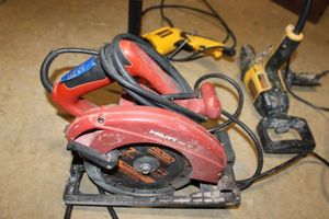 lot 237 image: Hilti WSC 167 corded circular saw plus DeWalt spade handle drill and hammer drill