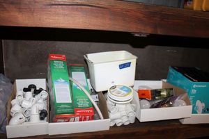 lot 249 image: Misc. plumbing parts and lighting parts