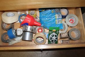 lot 269 image: Duct tape, wood dowel pins, pocket hole plugs, funnel and more