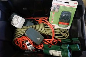lot 195 image: Extension cords, outdoor timers, and cord covers