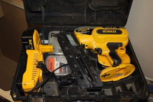 lot 194 image: DeWalt cordless nail gun as shown