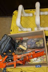 lot 198 image: Misc. tools PVC workout handles, caulking guns, tool bag and tools