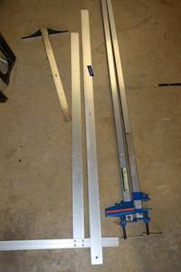 lot 200 image: Pittsburgh 60 bar clamps and Dry-wall T-squares