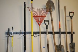 lot 192 image: Yard tools (not the rack on wall) and pin lock extension poles