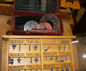 lot 210 image: Ryobi router bit set and small tool box
