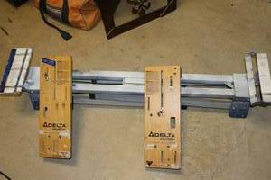 lot 223 image: Delta shopmaster miter saw stand