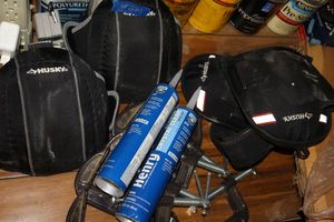 lot 221 image: Knee pads, Sealant tubes, C-clamps
