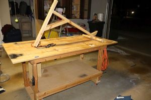 lot 293 image: Hand made rolling work table with extension arm and locking wheels
