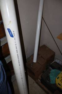 lot 300 image: PVC pieces (4 and 2) and wood blocks (9x10 and 9x12), rebar, painting tray