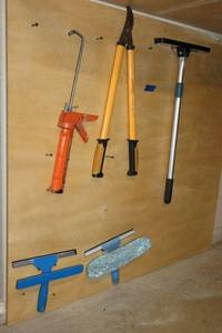 lot 301 image: Tools squeegees, caulking gun, branch trimmer