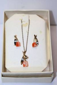 lot 12 image: Coral necklace and earring set - marked 14K GF PPO