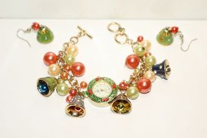 lot 14 image: Christmas watch and charm bracelet with matching bell earrings