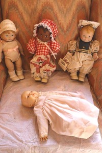 lot 23 image: Dolls Sailor Romper, Daisy Kingdom, and Madame Alexanders Victoria doll