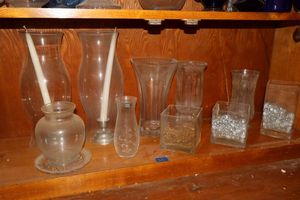 lot 39 image: Clear glass vases and hurricane lamp covers