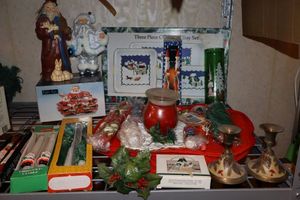lot 45 image: Christmas taper candles, tray set and Santa figurines