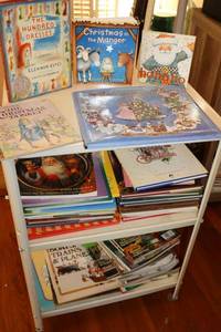 lot 82 image: Metal rolling cart with books and magazines