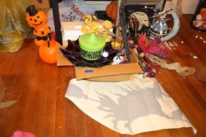lot 151 image: Halloween decorations with Lenox train and witch window cling
